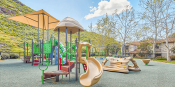 Playground with slides and other jungle-gym features. at The Villas at Anacapa Canyon, California, 93012